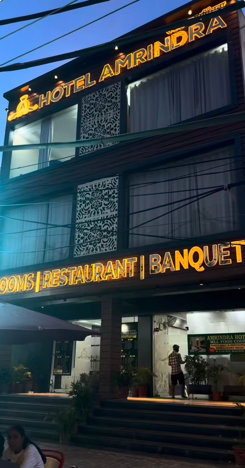 Hotel Amrindra exterior at dusk
